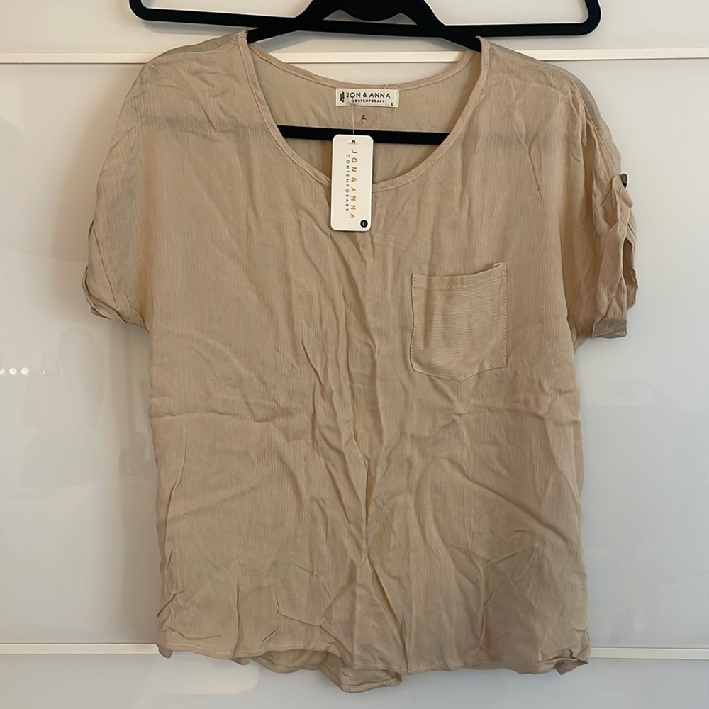 Got to go!! NWT Blouse with buttons going down back - Size Large